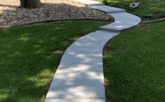 Curved-Concrete-Walkway-to-Back-Door-1.png
